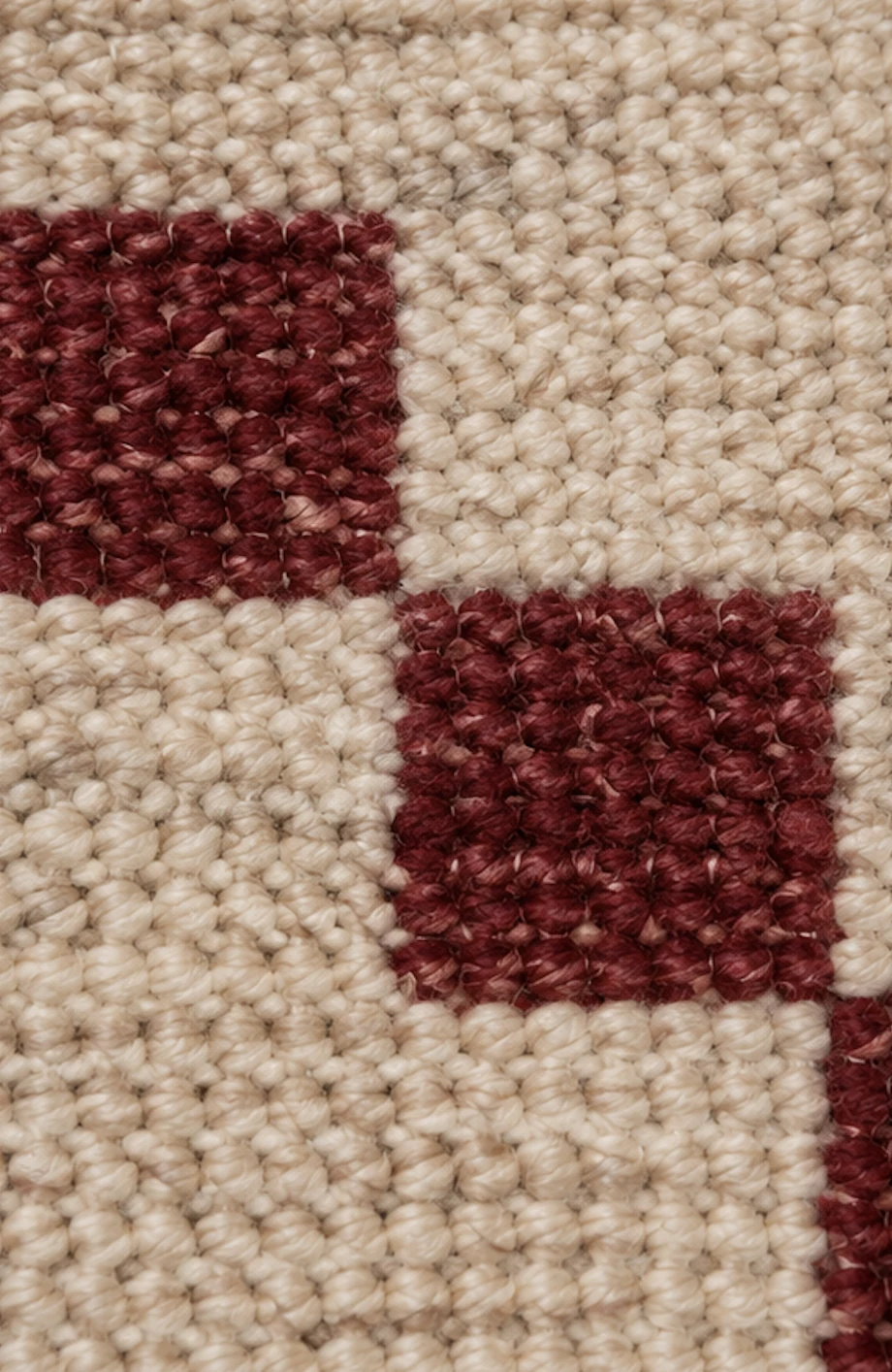 Hand-knotted wool rug detail from Bhadohi, India