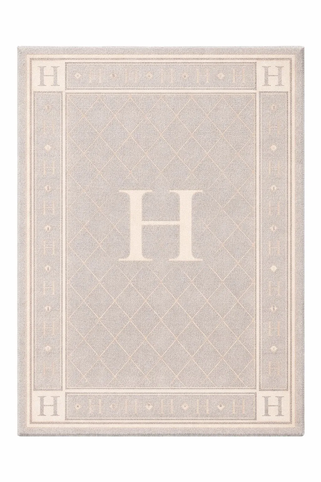Monogram Crest Mist luxury rug design
